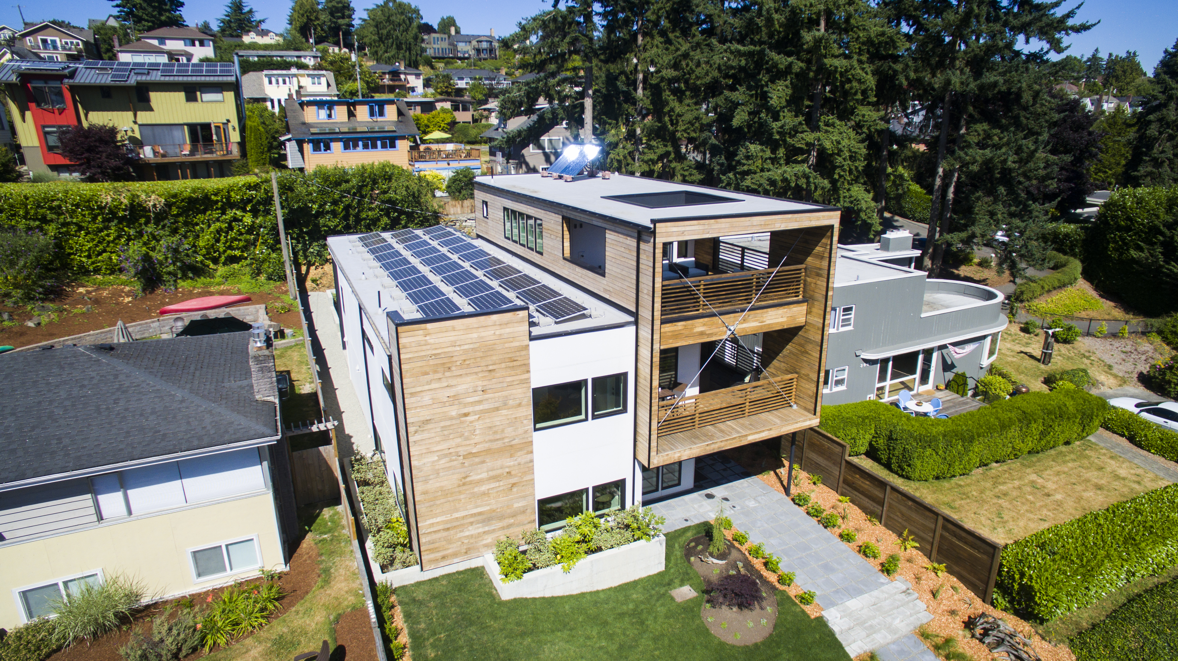 Dwell Development in Seattle won the top Housing Innovation Award in the Spec home category for a 3-story, 3700 square foot net zero energy home on Lake Washington. The company builds one-of-a-kind net-zero homes designed and detailed to compete with code-built homes.